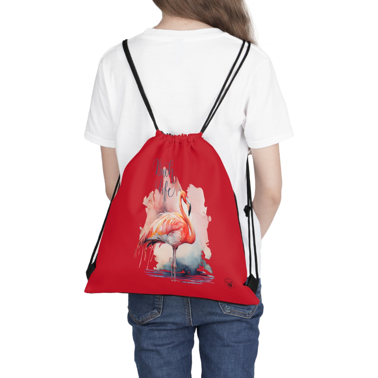 Unleash your wanderlust with our versatile drawstring backpack! Embrace travel with ease and style, flaunting a Beach Life Flamingo graphic with bright color backgrounds. This one is a red background. Designed for adventurers, it's the perfect blend of practicality and fashion. Get yours today for your next adventure! This is a front view of the backpack on the back of a model.